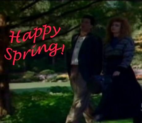 Micki and Ryan walking in a garden. Happy Spring!