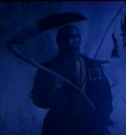 Scarecrow holding Scythe